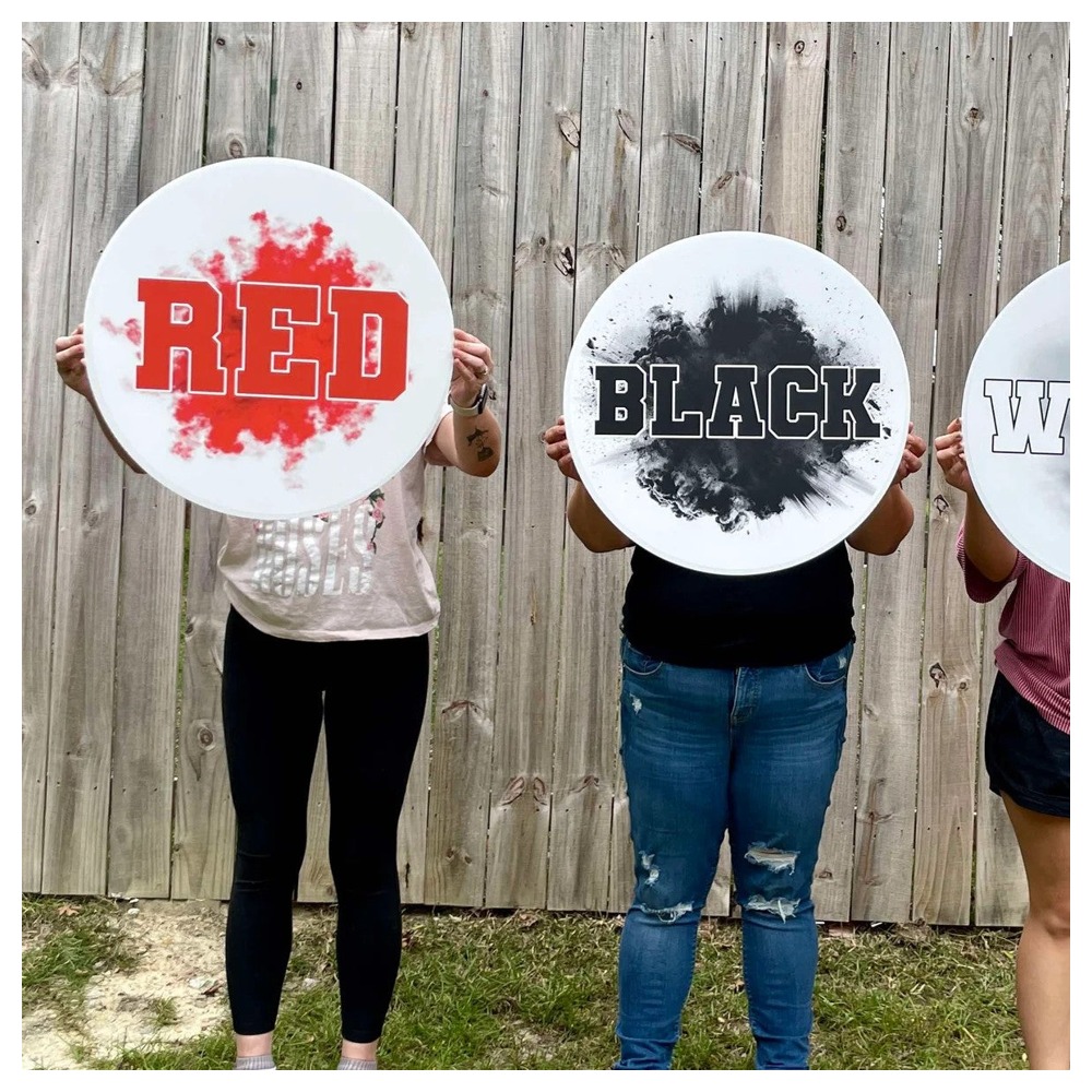 Photographed corrugated cheer sign in use