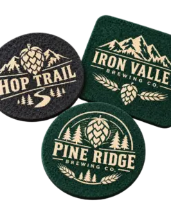 Brewery felt coasters with custom brewery logo samples on a transparent background
