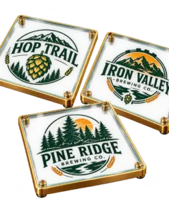 Brewery glass coasters with custom brewery logo samples on a transparent background