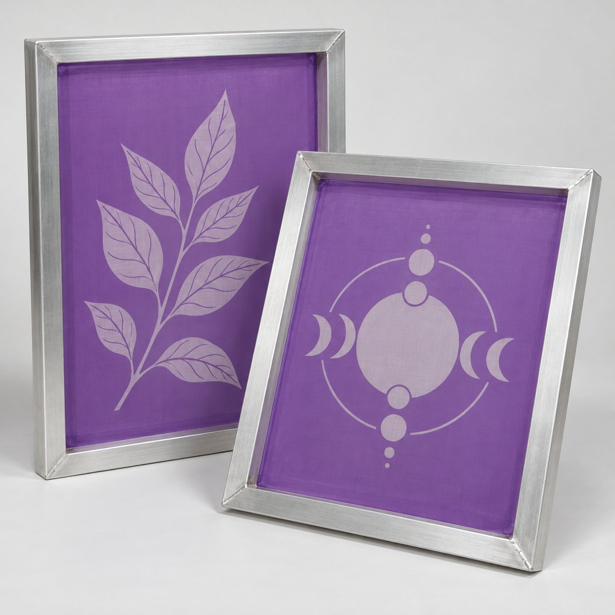 Illustrative custom pre-burned aluminum silk screen frames with purple emulsion and sample stencil artwork